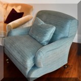F12. 2 Custom blue fabric club chairs. 35”h x 36”w x 36”d 